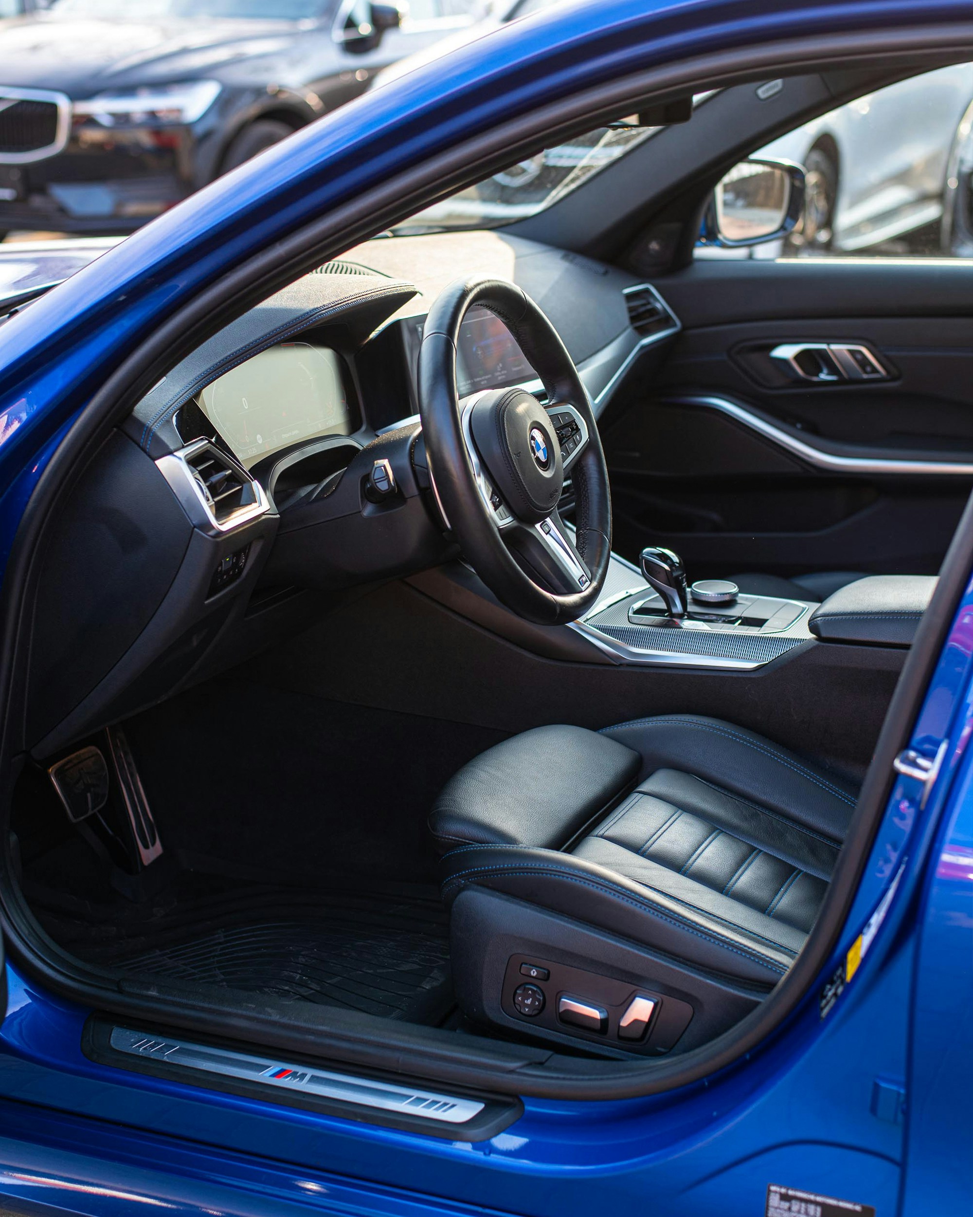 Technician working on car interior detailing