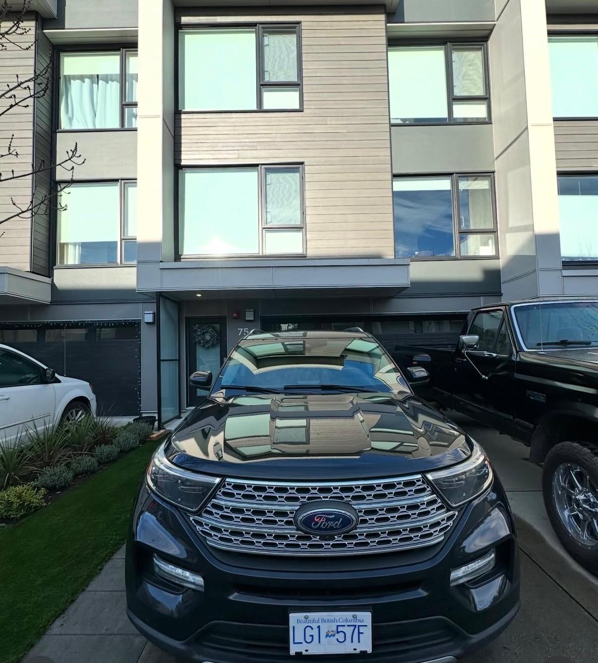 Mobile car detailing car parked in a rainy Surrey driveway – professional service at your home in BC weather